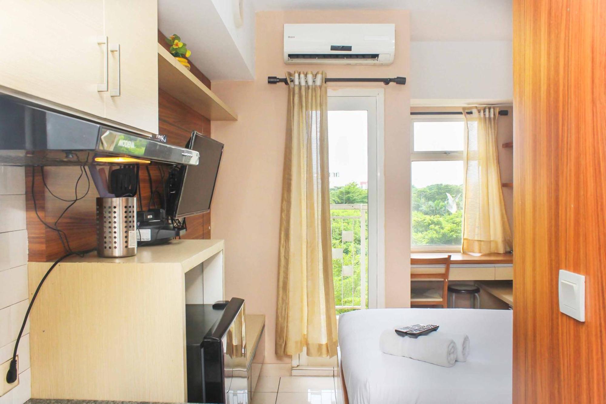 Apartemen Cozy At Springlake Summarecon By Travelio